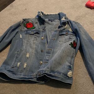 Embroidered Jean jacket with rips long sleeve